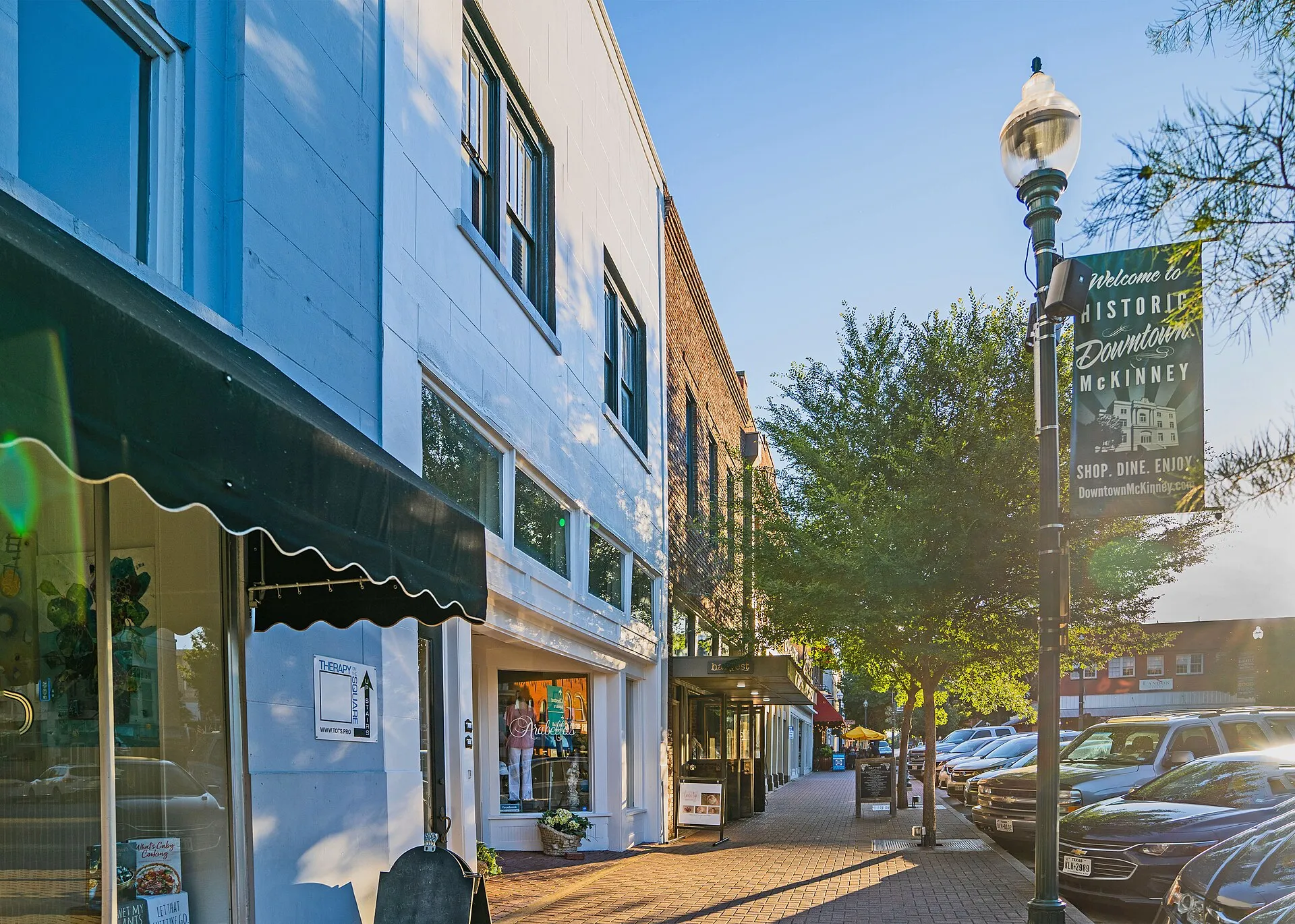 Illustrative historic downtown storefronts in McKinney, Texas